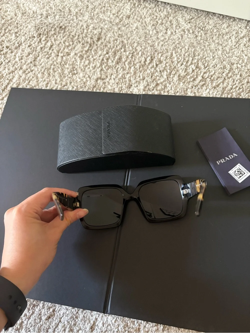 Prada Black Frame Sunglasses with Tortoiseshell Temples